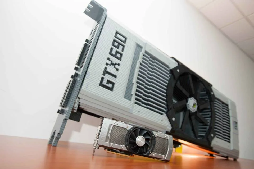 LEGO GeForce GTX 690 build by Xiaosheng Li, next to the real graphic card